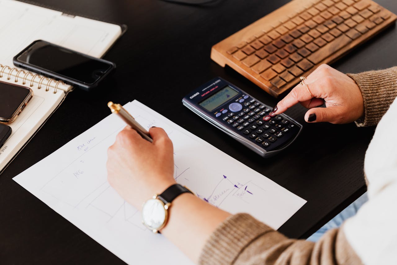 bookkeeper reviewing payroll figures